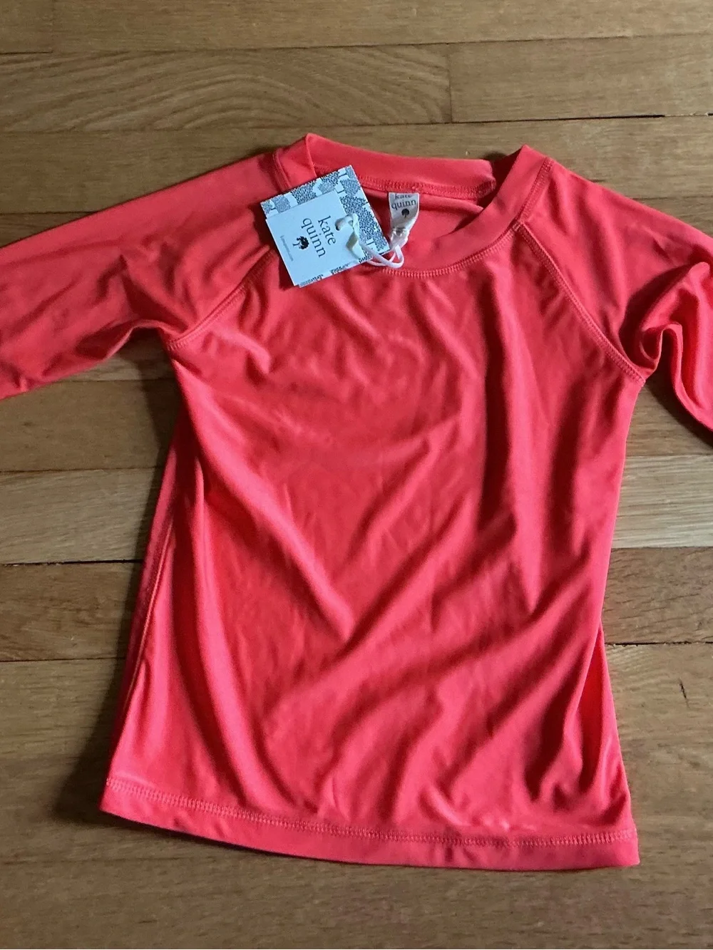 kate quinn Coral Short Sleeve Rash Guard Top